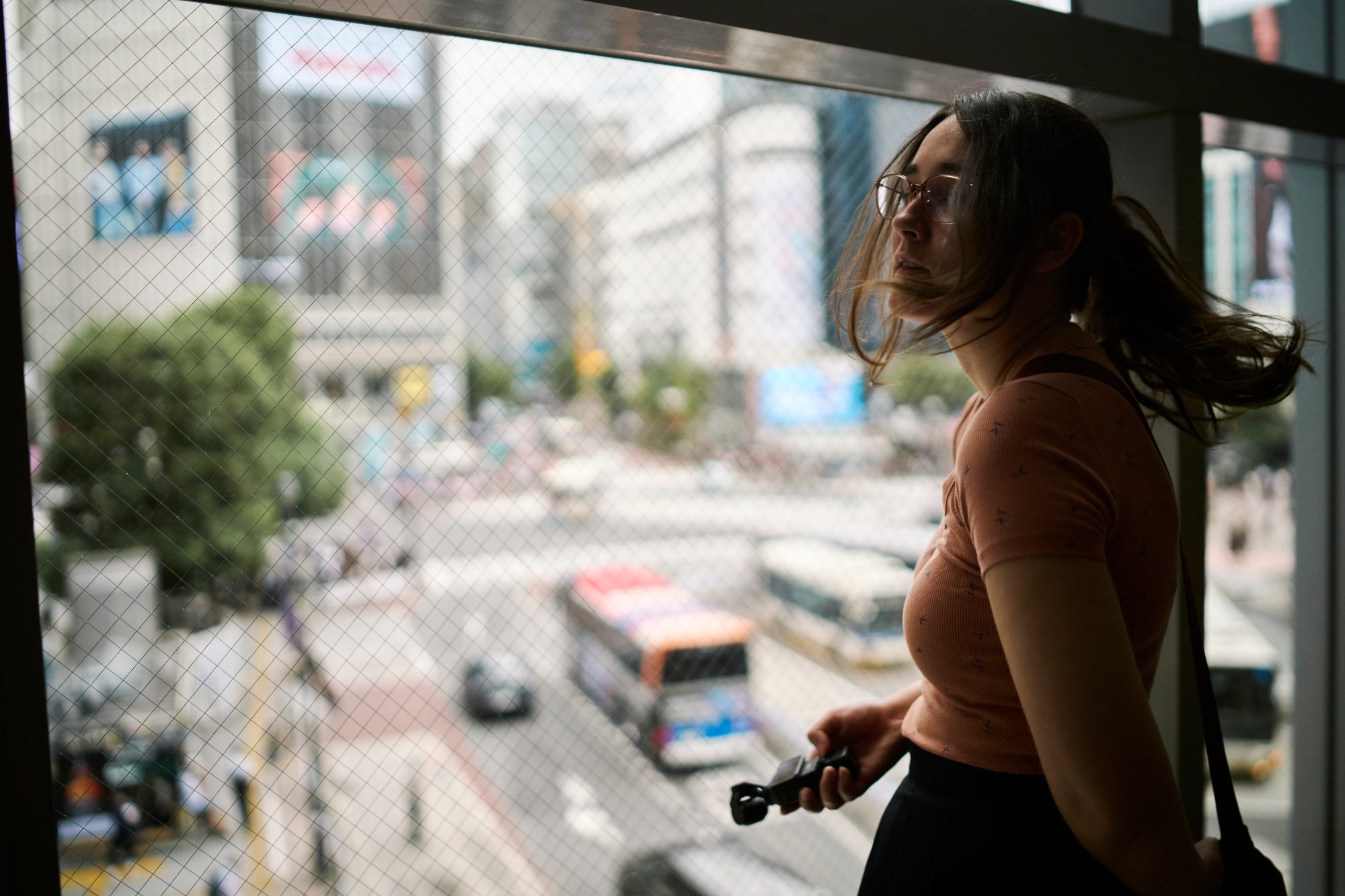 Looking down over a busy intersection from a window