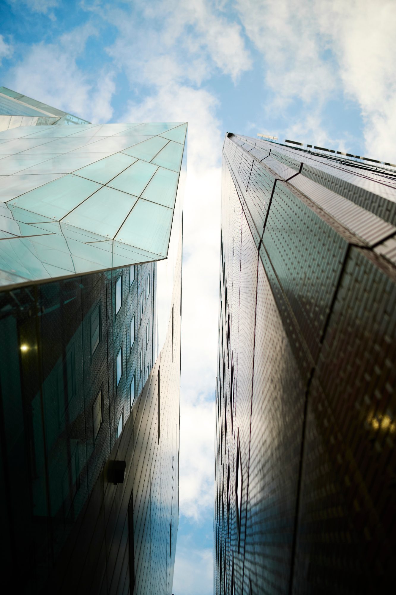 Looking up a faceted glass tower