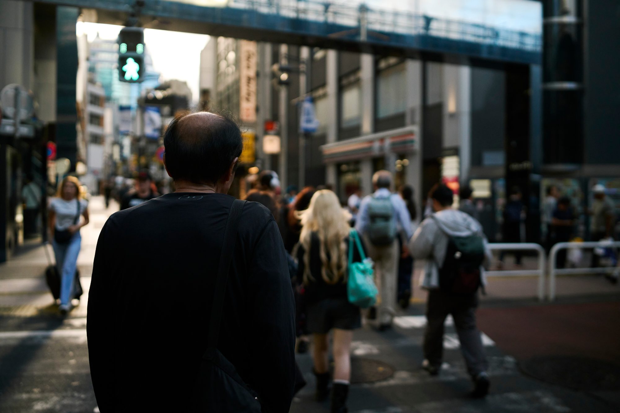 A crowded street at dusk