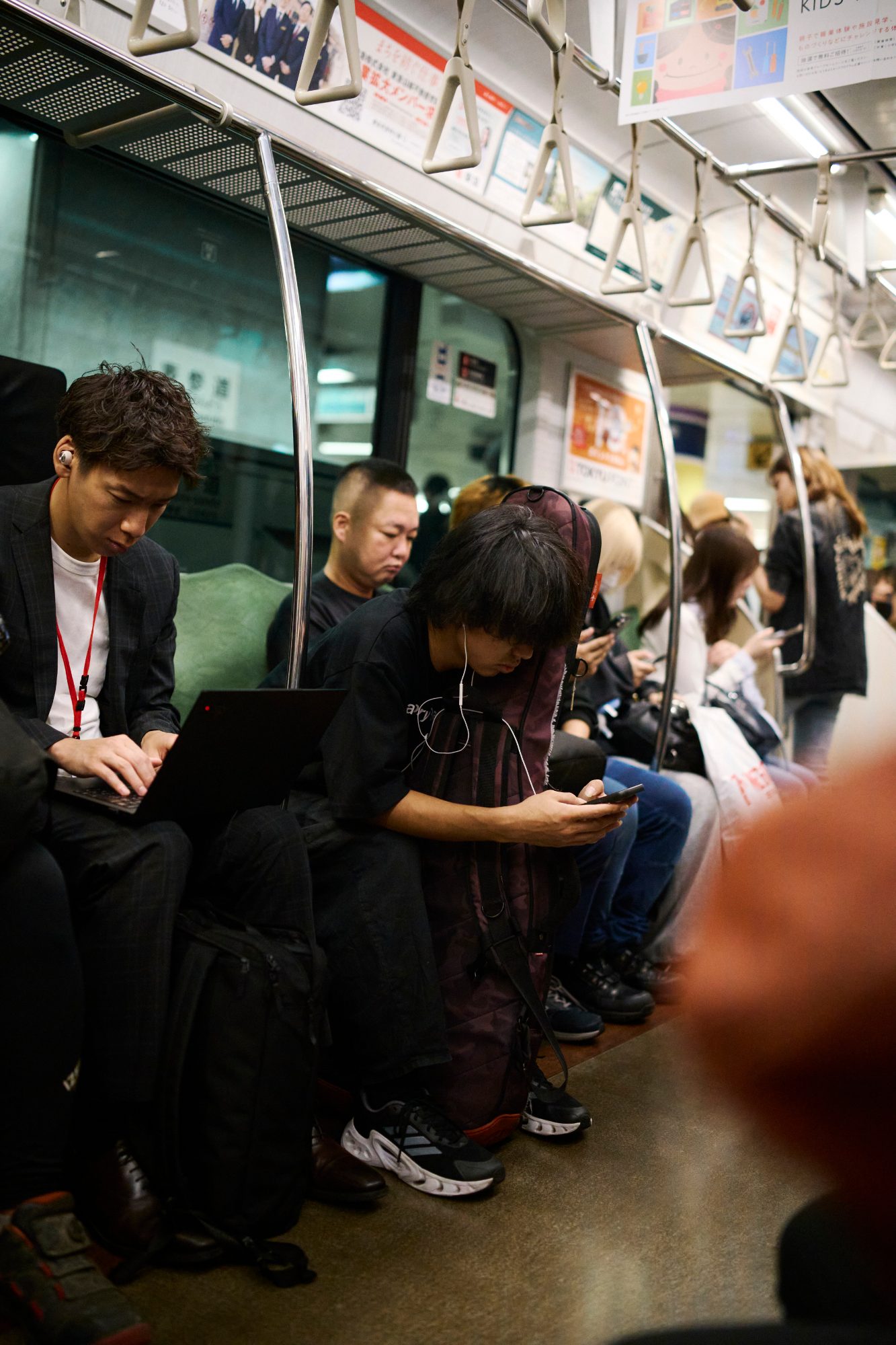 Passengers on a late train home