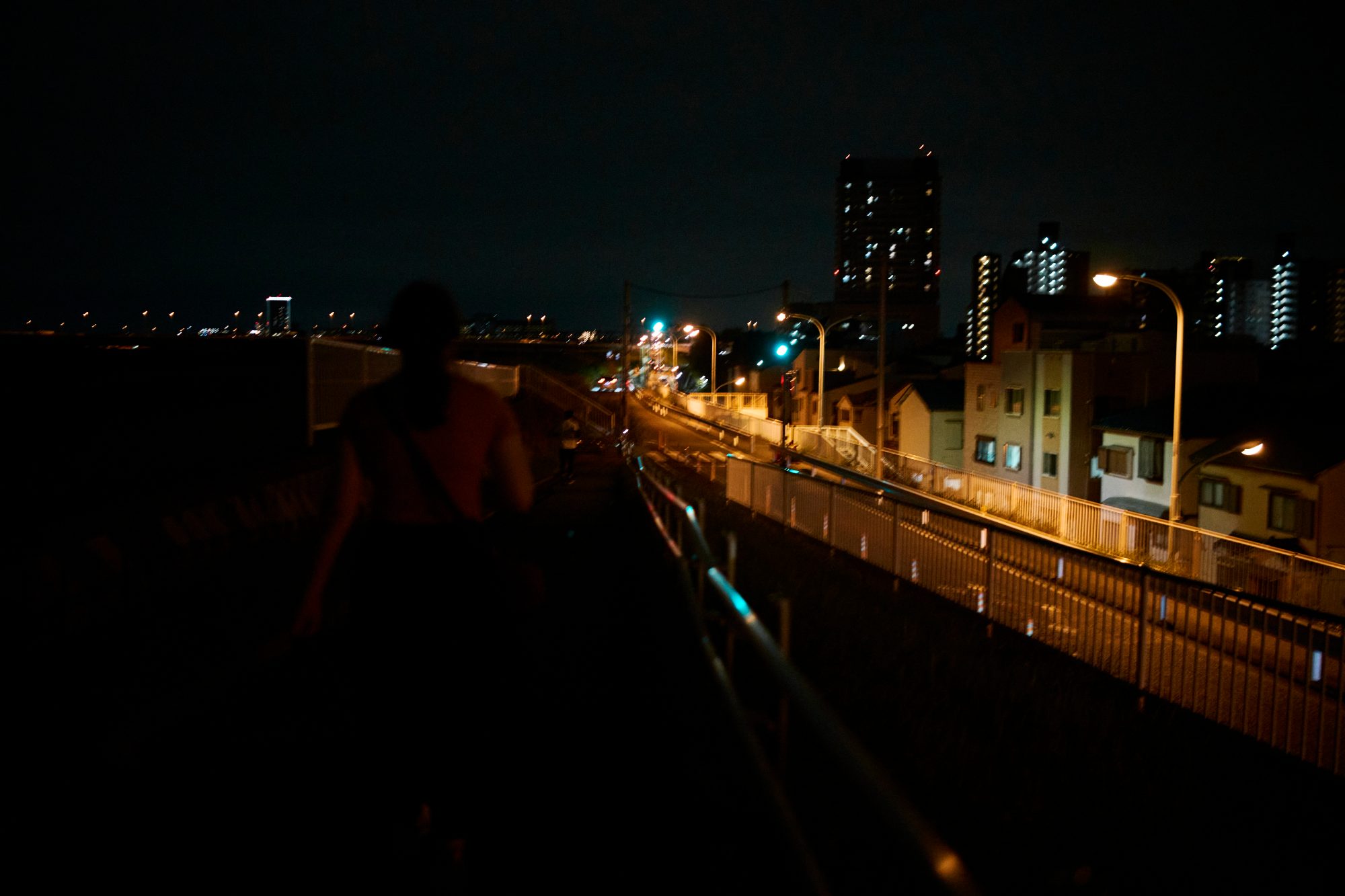 Highway lights streaking past at night